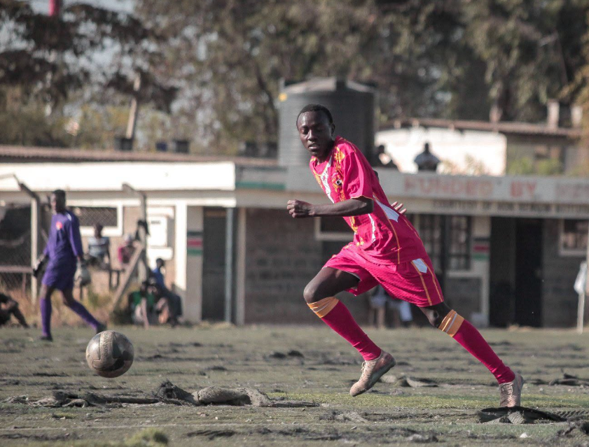 A young player risking an injury while playing The current dilapidated Camp Toyo Stadium in Nairobi's Jericho estate. PHOTO/https://www.facebook.com/Jerichoallstarsofficial
