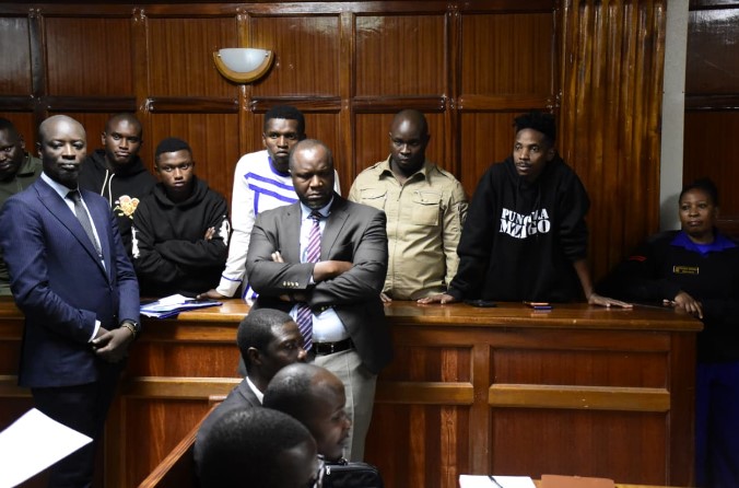 Eric Omondi and his co-accused (flagged by their lawyers) appear before Milimani Principal Magistrate Caroline Nyaguthii on Tuesday, September 8, 2026.PHOTO/Zipporah Ngwatu