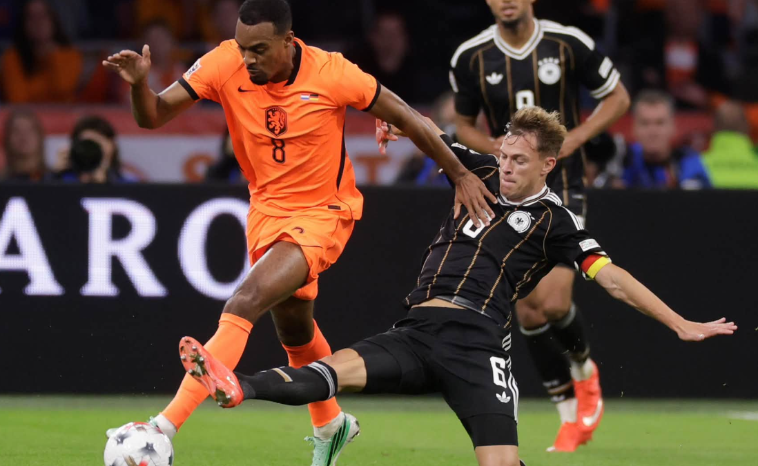 Klopp returns to the touchline but Xavi holds his Germany to a draw in their debut