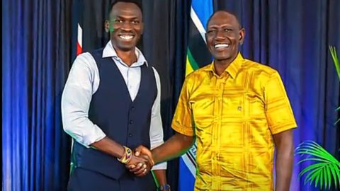 Trevor Ombija with William Ruto. PHOTO/Screengrab by K24 Digital from video shared by @trevorombijahsc/ TikTok