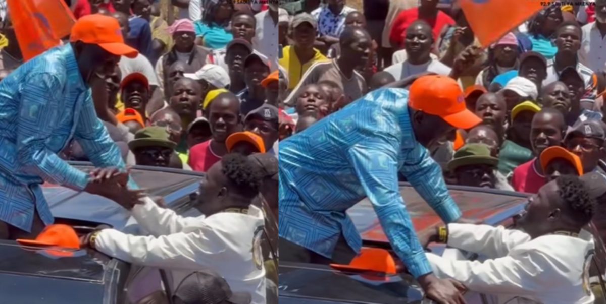 William Ruto shares a light moment with Omosh One Hour. PHOTO/https://www.facebook.com/williamsamoei