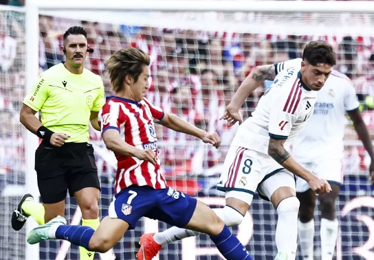 Atletico Madrid pile pressure on Mourinho as 10-man Real Madrid fall in feisty derby