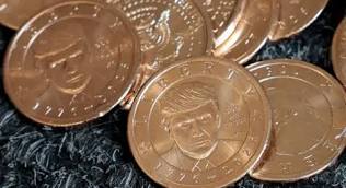 Trump makes history as first living US president to appear on currency in a century