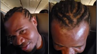 Peter Salasya gets hair braided by woman he met on flight to Abu Dhabi