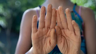 Why fingers wrinkle in water and what your body is doing about it